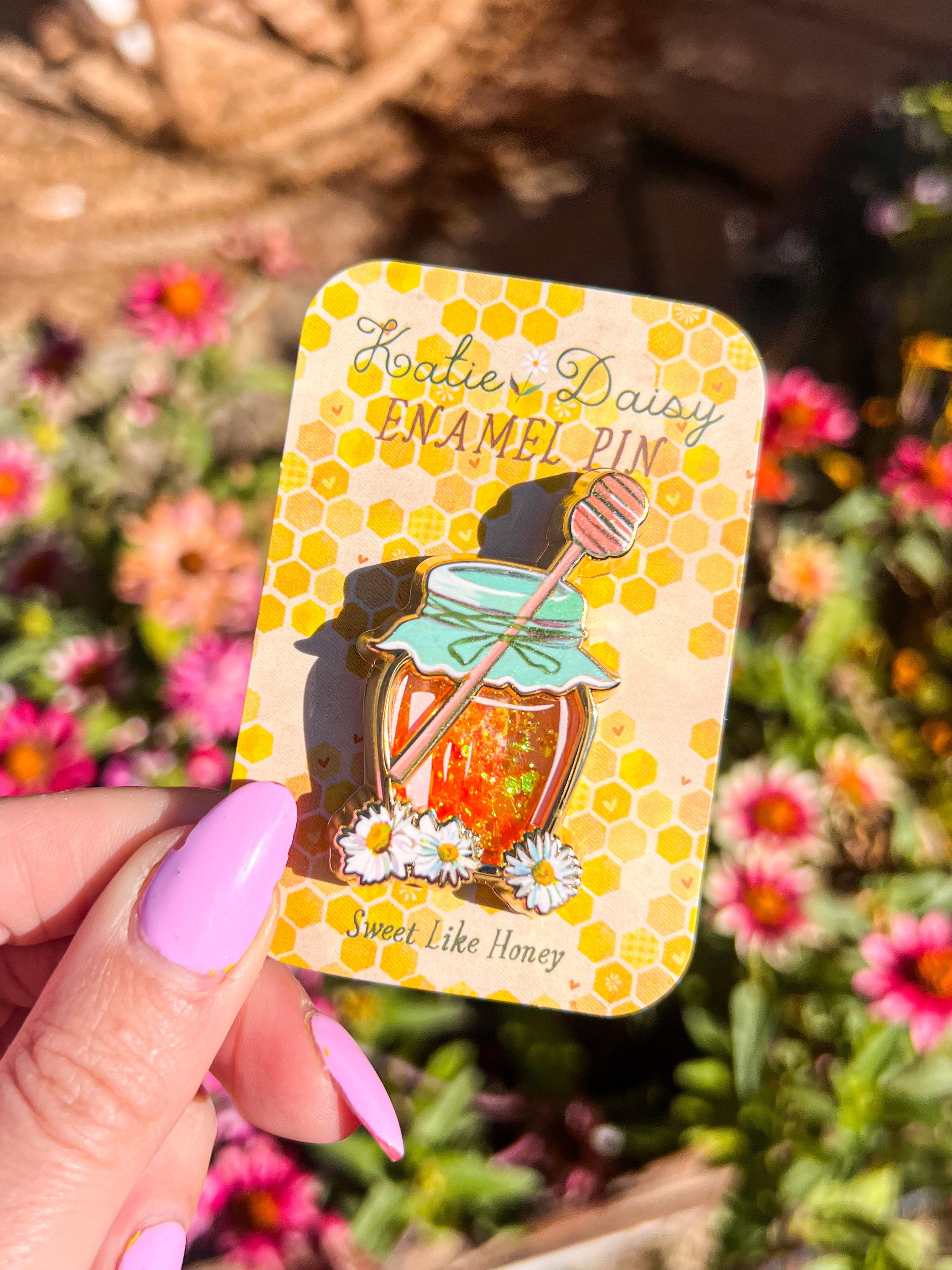Interactive Honey Jar Enamel Pin with liquid glitter